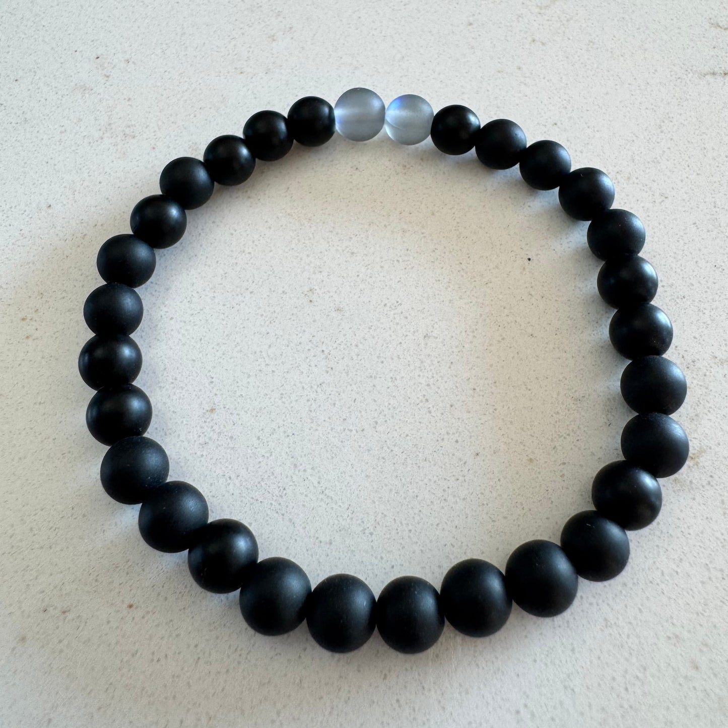 6mm Matte Black Onyx Gemstone Stretch Bracelet with Clear Mystic Aura Glass Beads