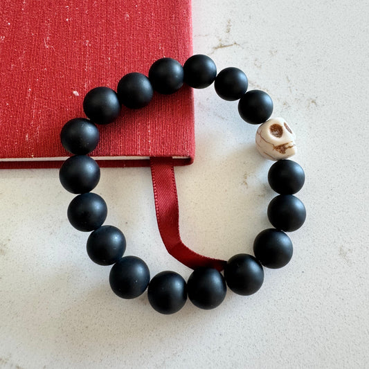 10mm Matte Black Onyx Gemstone Bead Stretch Bracelet with White Skull Accent Bead