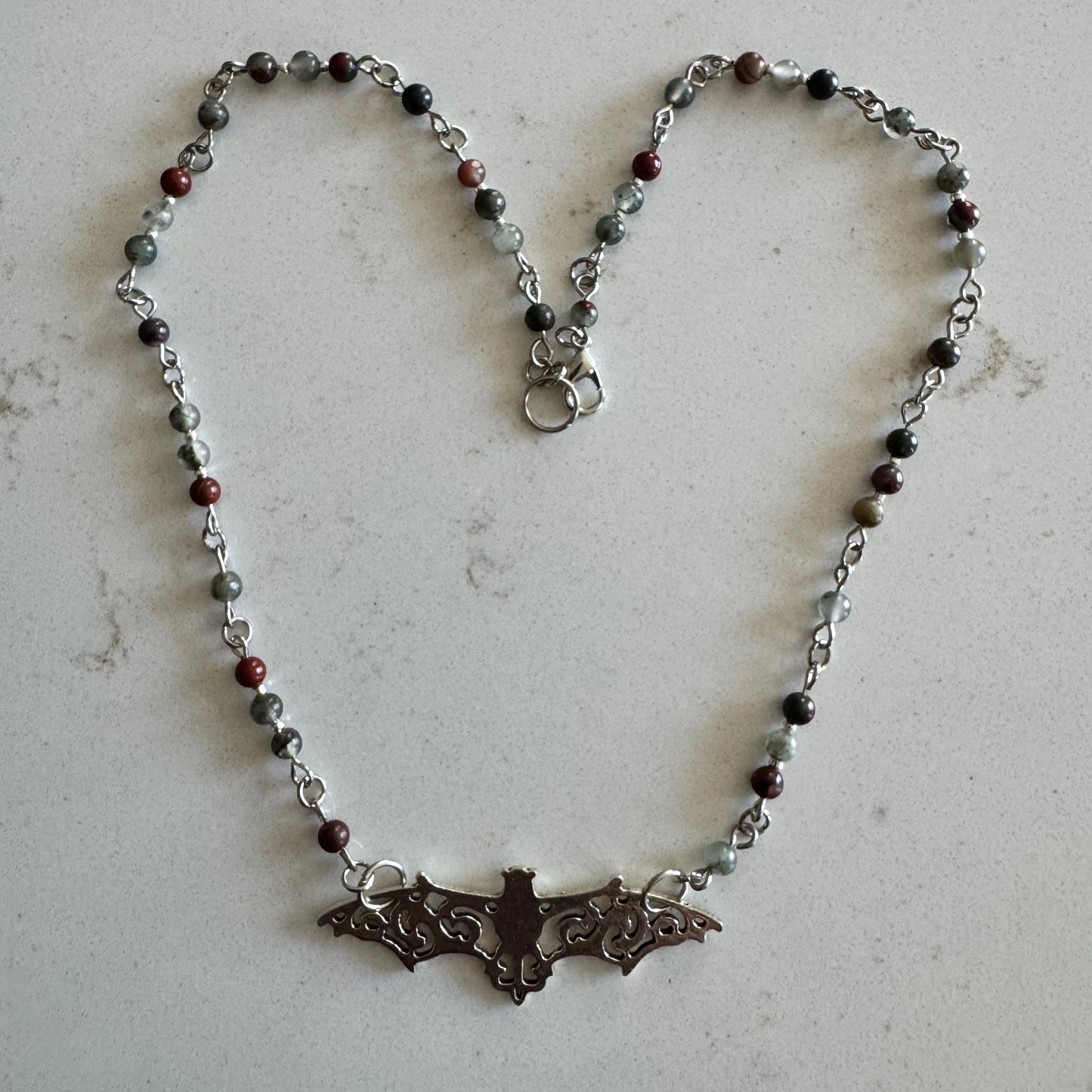 4mm African Bloodstone Gemstone Bead Necklace with a Silver Filigree Bat Pendant