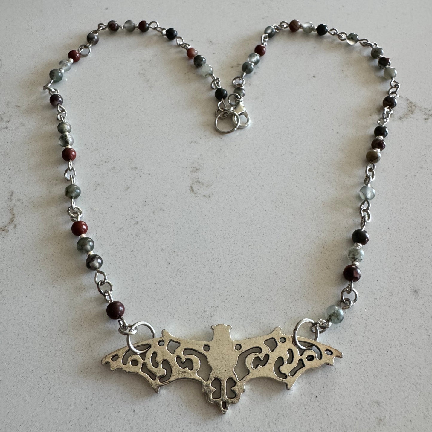 4mm African Bloodstone Gemstone Bead Necklace with a Silver Filigree Bat Pendant