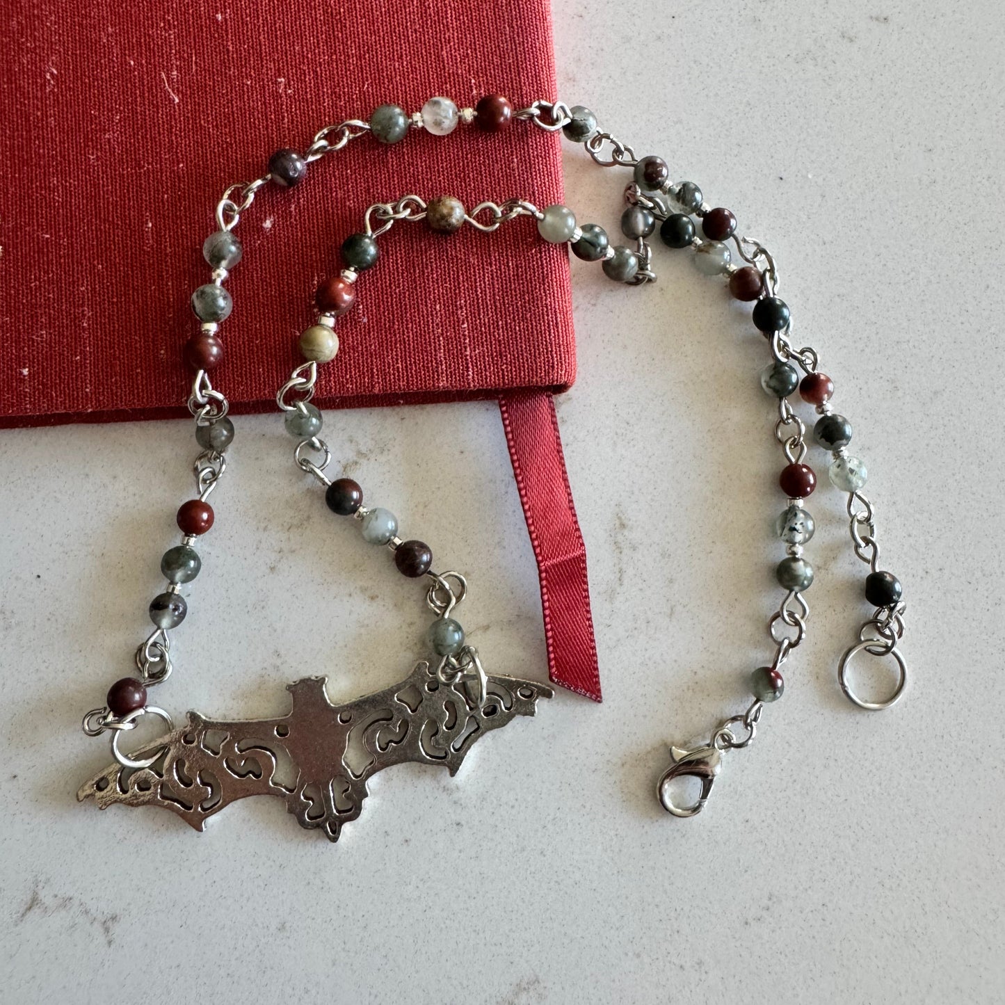 4mm African Bloodstone Gemstone Bead Necklace with a Silver Filigree Bat Pendant